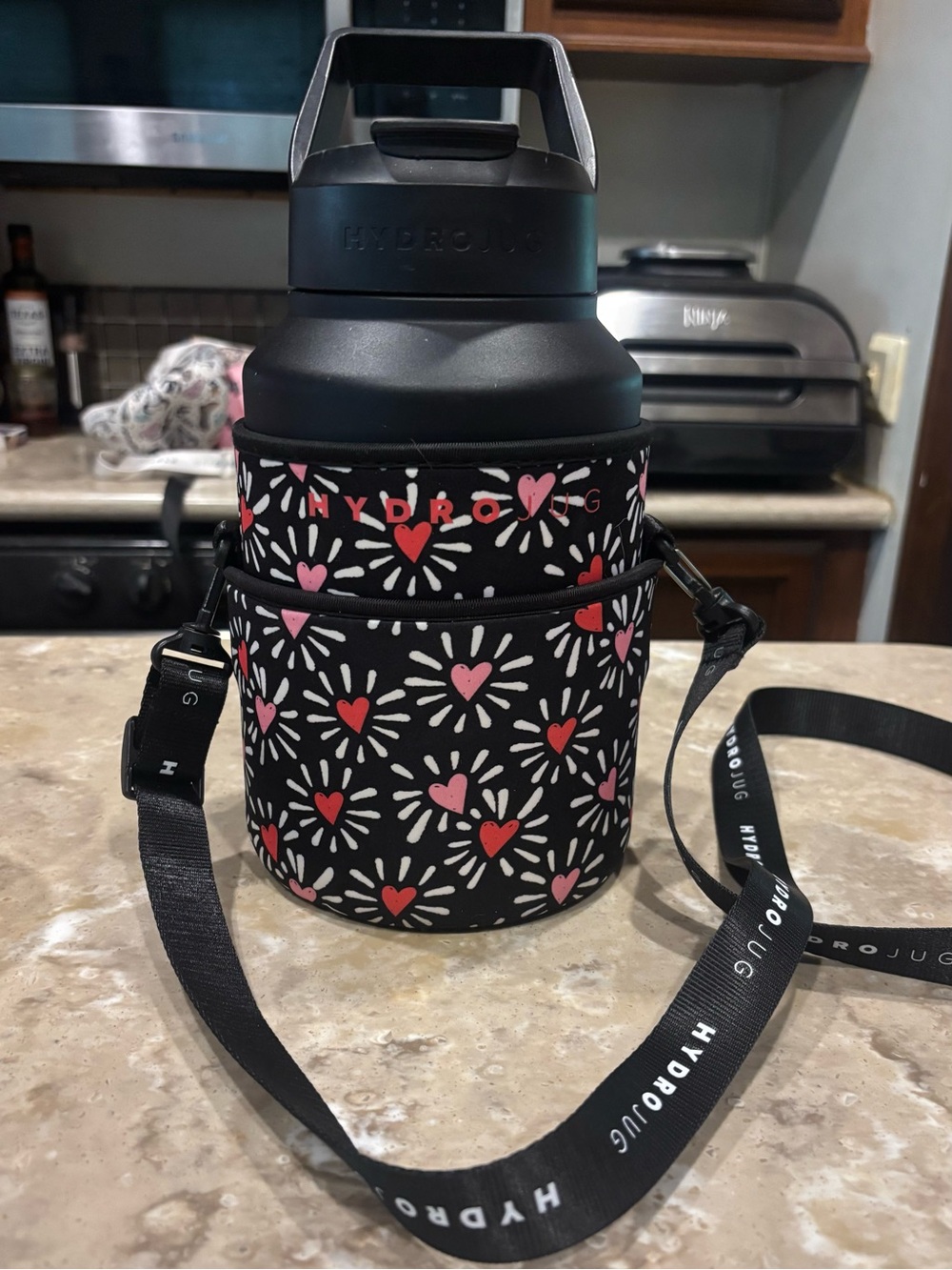 HydroJug Black Crossbody Bottle Bag with Pink & Red Hearts